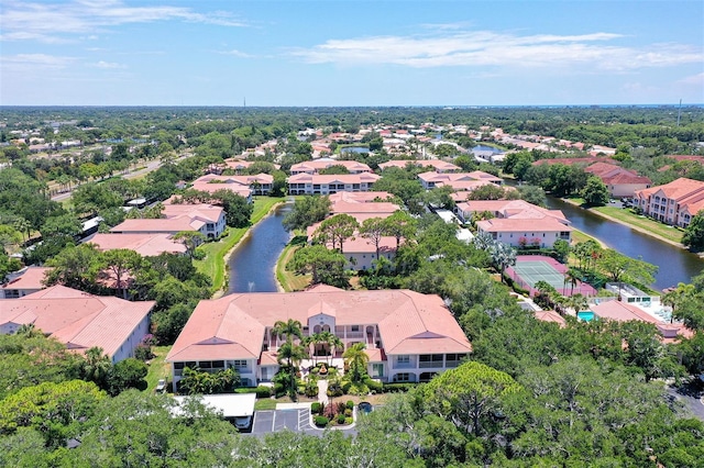 bird's eye view with a water view