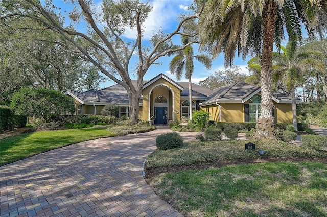 view of front of home with a front lawn