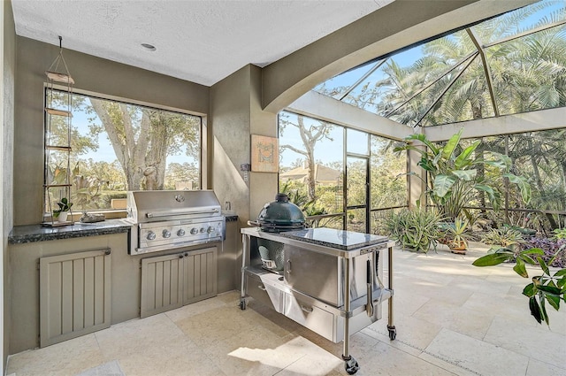 view of patio / terrace featuring area for grilling and a mountain view