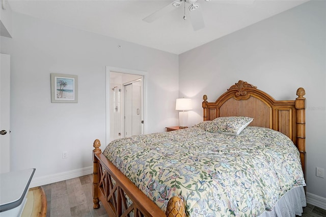 bedroom with ceiling fan and light hardwood / wood-style flooring