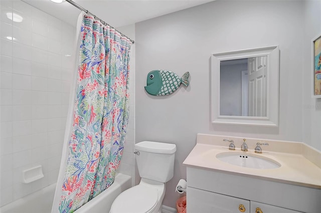 full bathroom featuring vanity, shower / bath combination with curtain, and toilet