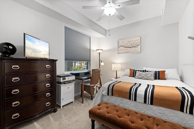 bedroom with ceiling fan and light carpet