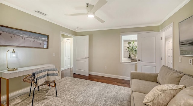 office with ceiling fan, ornamental molding, and dark wood-type flooring