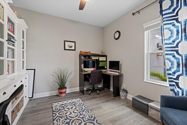 office space featuring hardwood / wood-style floors and ceiling fan