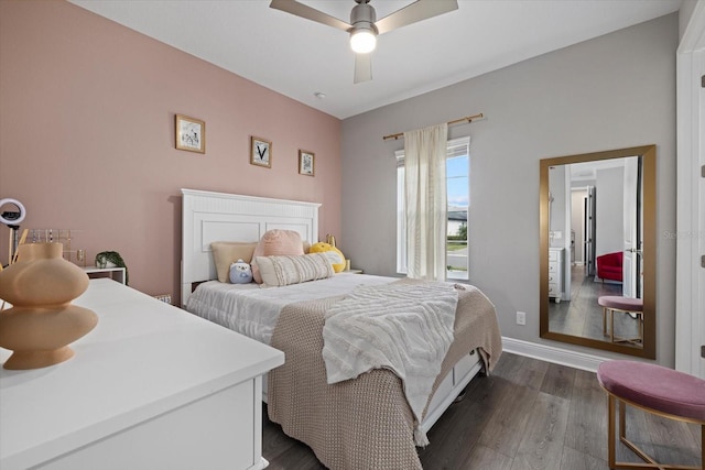 bedroom featuring dark hardwood / wood-style flooring and ceiling fan