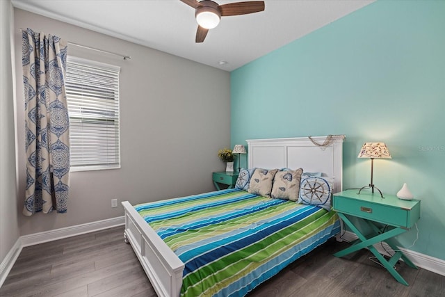 bedroom with hardwood / wood-style floors and ceiling fan