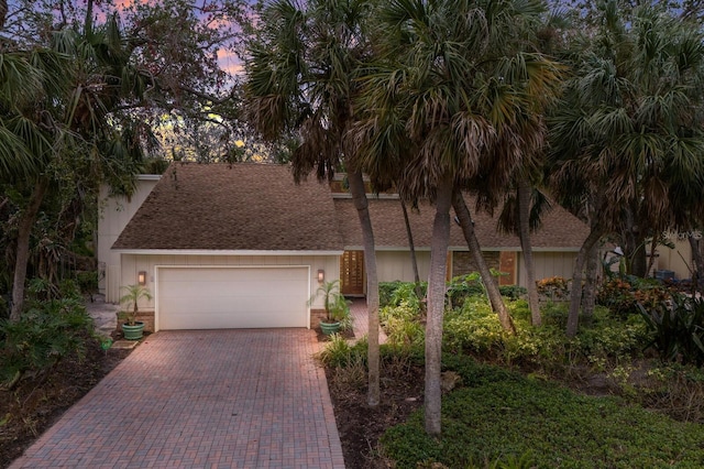 view of front of property featuring a garage