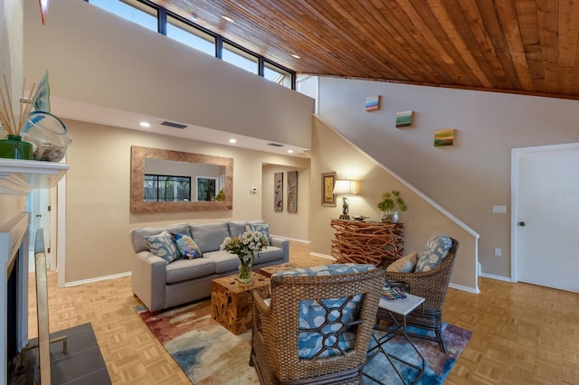 living room with light parquet floors, wooden ceiling, and high vaulted ceiling