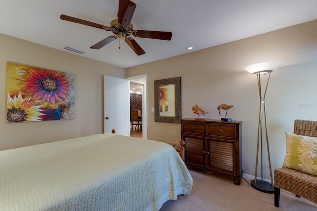 carpeted bedroom featuring ceiling fan