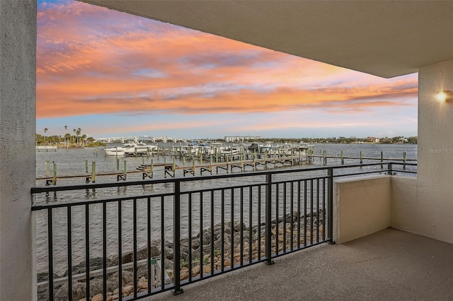 balcony at dusk with a water view