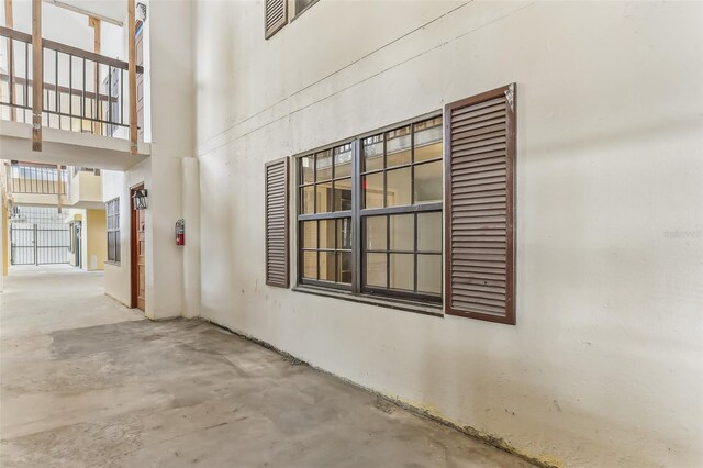 interior space with concrete floors and a high ceiling