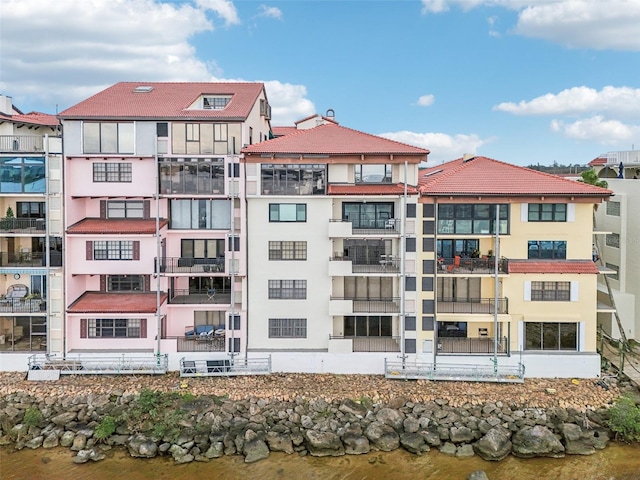 view of property with a water view