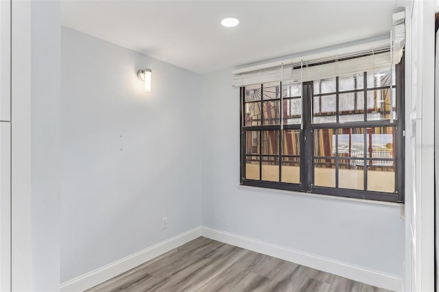 empty room featuring hardwood / wood-style floors