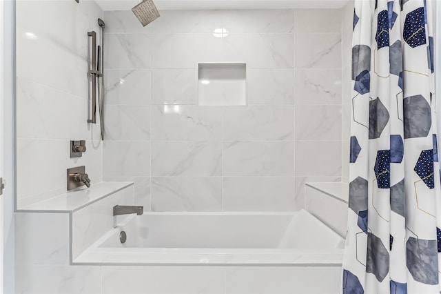 bathroom with shower / tub combo