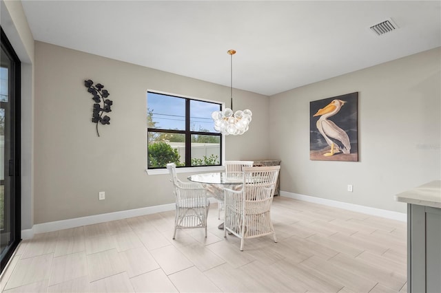 dining room featuring an inviting chandelier