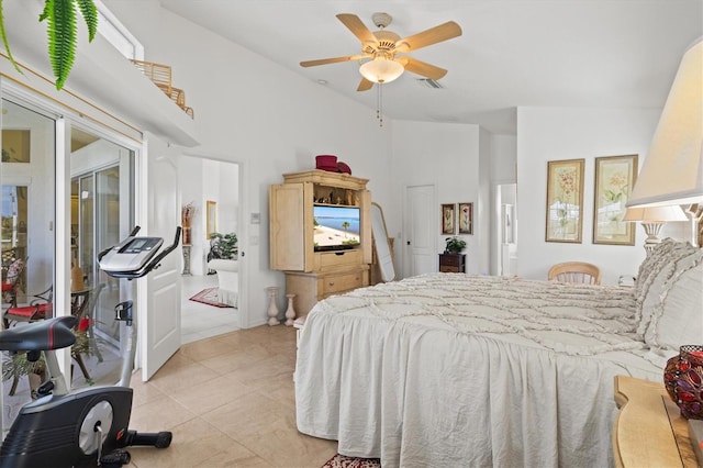 bedroom featuring light tile patterned flooring, lofted ceiling, and ceiling fan