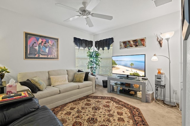 living room featuring ceiling fan and light carpet