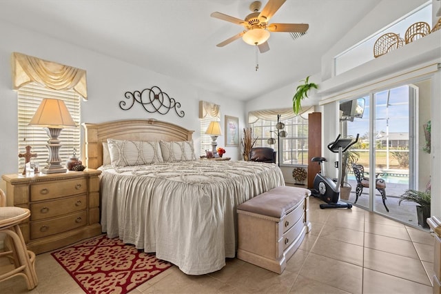 tiled bedroom with ceiling fan, access to exterior, vaulted ceiling, and multiple windows