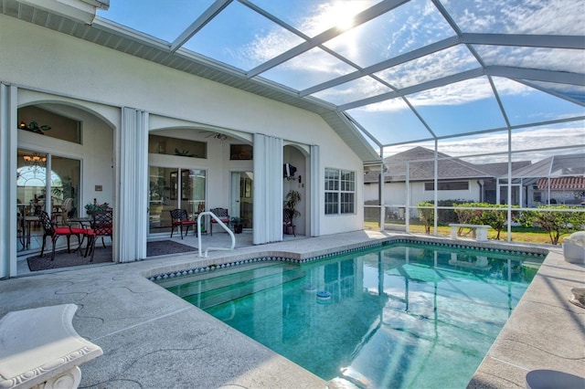 view of pool featuring a lanai and a patio