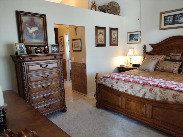 bedroom with light colored carpet