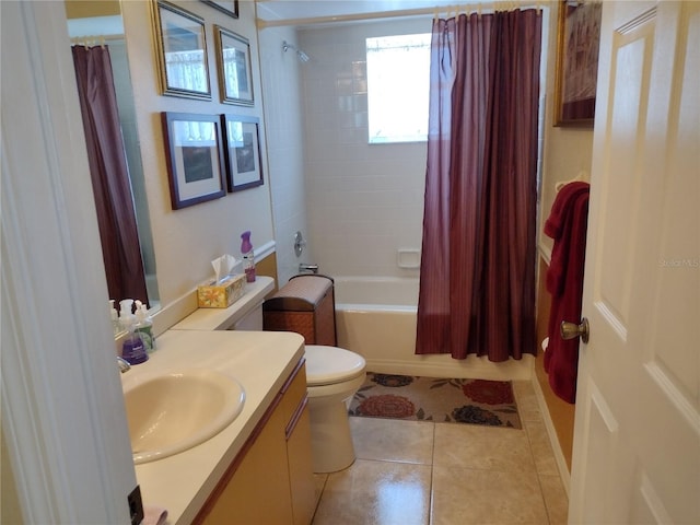 full bathroom featuring tile patterned floors, shower / bath combo, toilet, and vanity