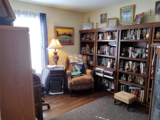 living area featuring hardwood / wood-style floors