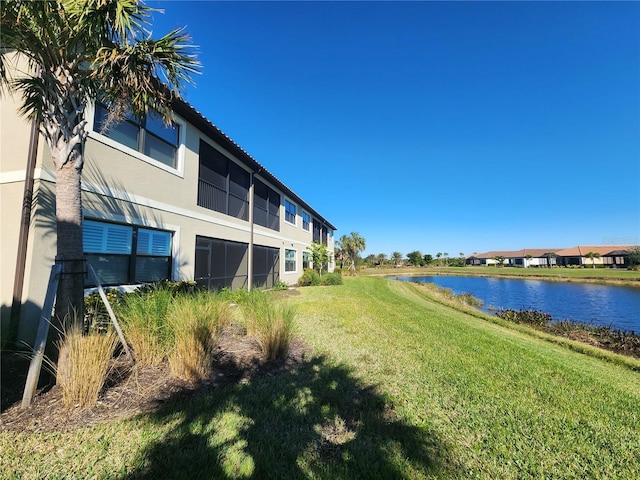 view of yard with a water view