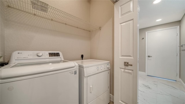 laundry area featuring separate washer and dryer