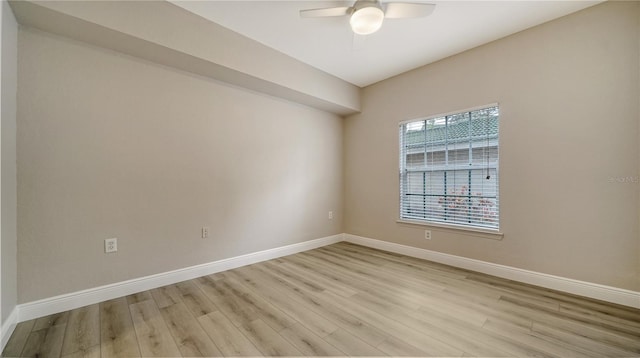 unfurnished room featuring light wood-type flooring and ceiling fan