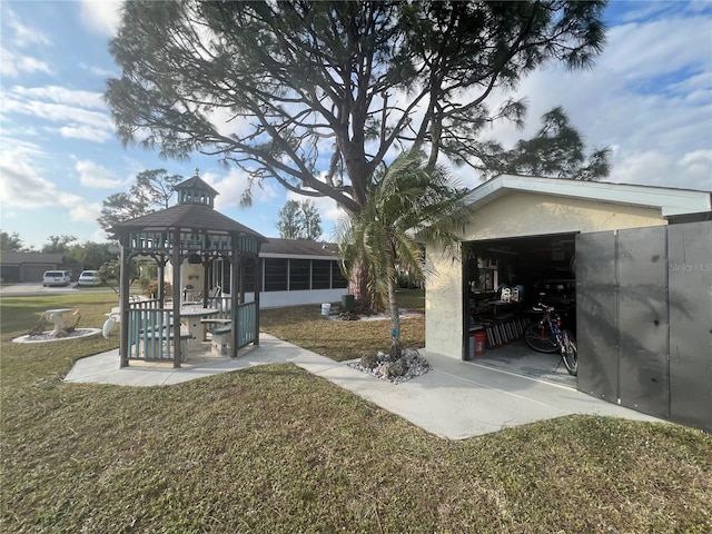 view of yard with a sunroom