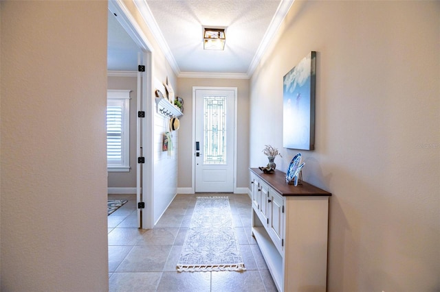 entryway with a textured ceiling and ornamental molding