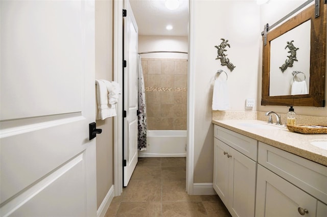 bathroom with vanity and shower / tub combo