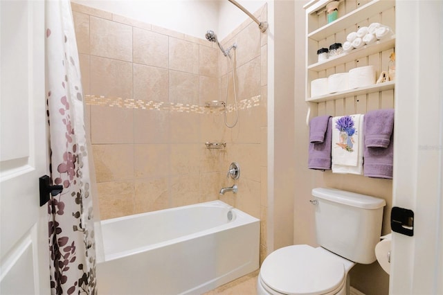 bathroom featuring toilet and shower / tub combo