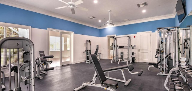 gym with ceiling fan, a healthy amount of sunlight, and crown molding