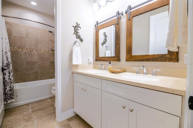 full bathroom featuring toilet, vanity, and shower / tub combo with curtain