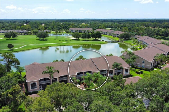 birds eye view of property featuring a water view