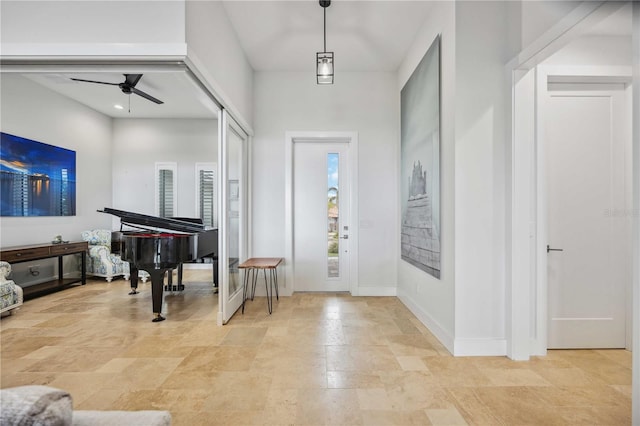 entryway with ceiling fan