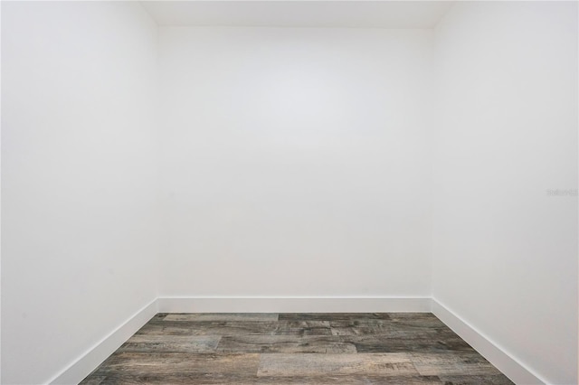 unfurnished room featuring dark hardwood / wood-style floors