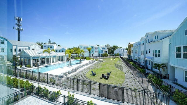 view of property's community with a swimming pool