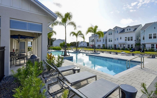 view of pool featuring a patio area