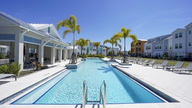 view of swimming pool featuring a patio