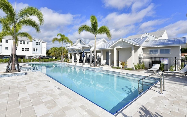 view of swimming pool featuring a patio