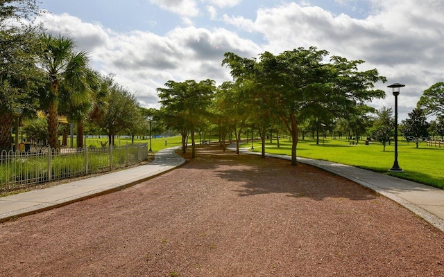 view of home's community with a lawn