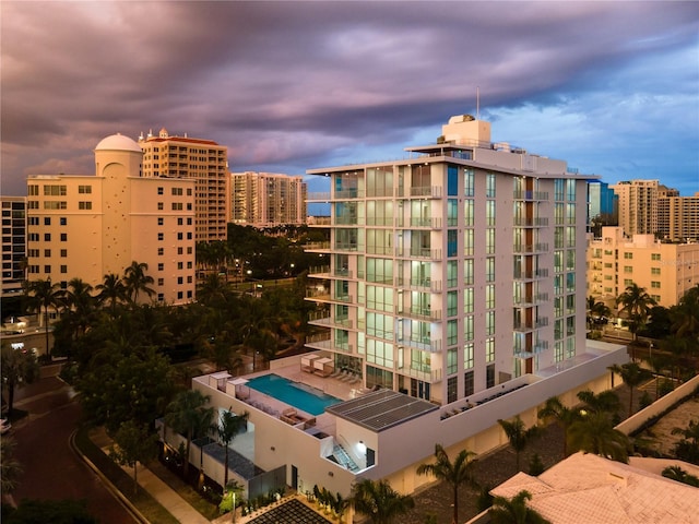 view of outdoor building at dusk