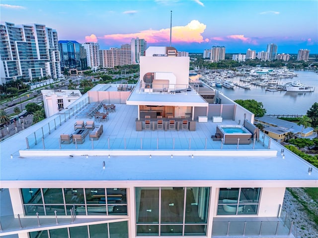 111 Golden Gate Pt Unit 701Ph, Sarasota, FL 34236 - drone / aerial view with a city view and a water view