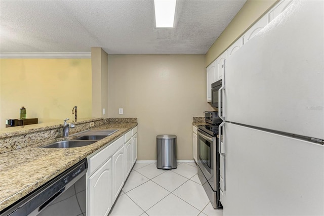 kitchen featuring black appliances, white cabinets, sink, a textured ceiling, and light tile patterned flooring