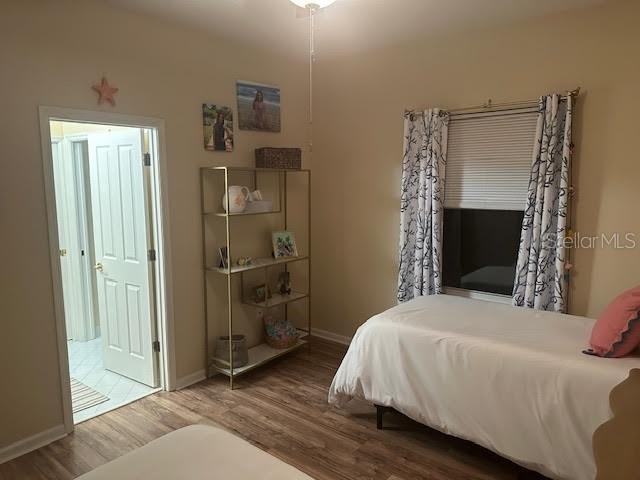 bedroom featuring hardwood / wood-style flooring