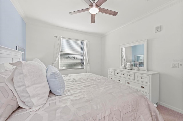 bedroom featuring ceiling fan, ornamental molding, and light colored carpet