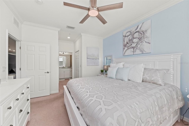 carpeted bedroom featuring ceiling fan, connected bathroom, and crown molding