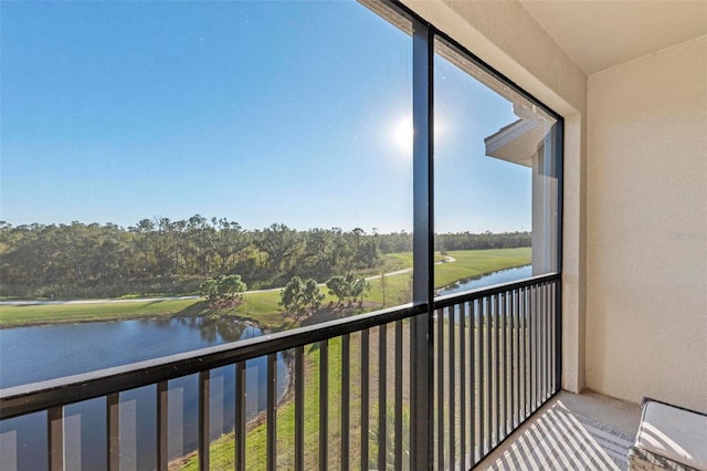 balcony featuring a water view